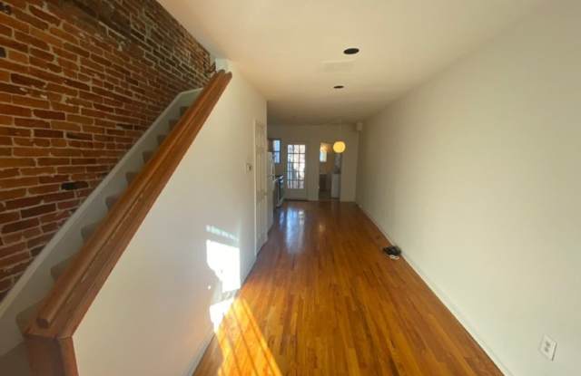 PRICE REDUCTION! A charming two bedroom one and one half  bath row house located just off New Jersey Ave in the Shaw Neighborhood! Gallery 3