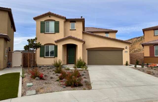 MOVE IN SPECIAL! $1000 off 1st month rent if you move in the month of January! Spacious 4 Bedroom Corner Lot Home with Solar  Mountain Views in Nichols Ranch - 19401 Brush Creek Way, Lake Elsinore, CA 92532