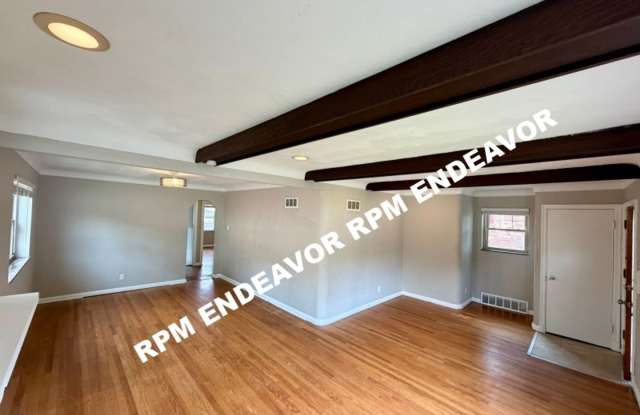 Spacious U-City Home with Finished Lower Level & 2 Car Garage Gallery 1