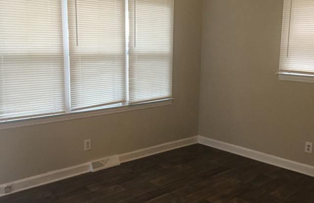 4 Bed / 2 bath! Large yard w/ carport & central HVAC! Gallery 4