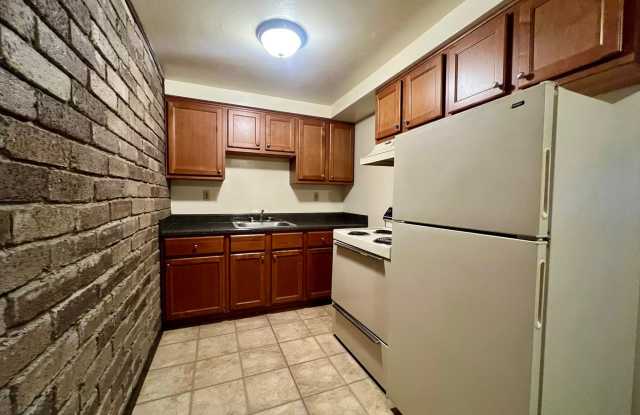 Cozy One Bedroom Apartment! Exposed Brick, Off-Street Parking & More! Call Today! photos photos
