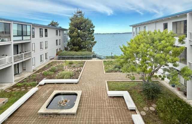 TOP FLOOR, WATER VIEW  STUDIO with ENCLOSED BALCONY at WATERGATE Gallery 1