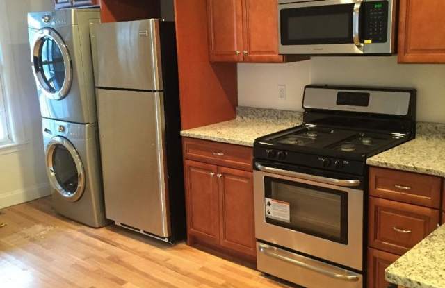 Nicely updated 3 bed with in-unit laundry in Brookline Village! photos photos