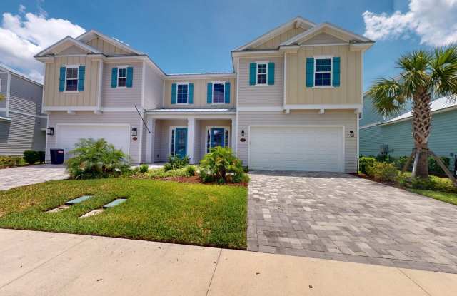 This stunning 4-bedroom, 3-bath townhome offers over 2,500 sq. ft. of thoughtfully designed living space. photos photos