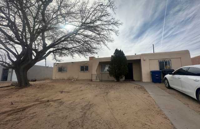 Welcome to this charming 3-bedroom, 2-bathroom home located in Albuquerque, NM photos photos