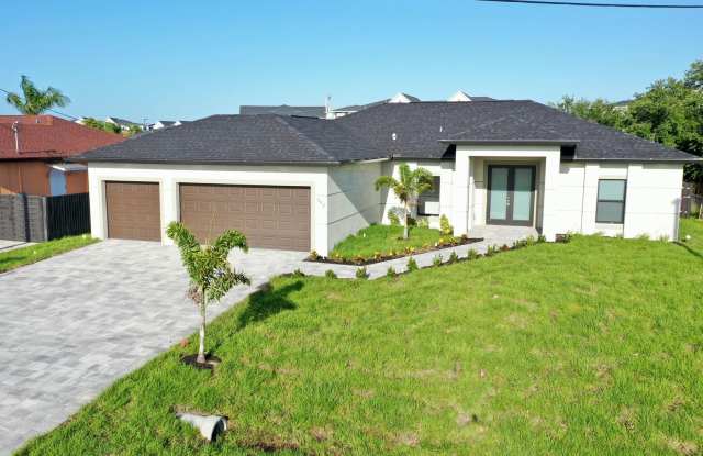 Modern Comfort Meets Florida Charm – Stunning 4-Bedroom Home in Cape Coral! photos photos