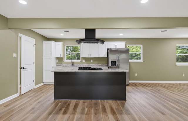 Fully Renovated 4-Bedroom Home with Brand-New Kitchen, New Flooring & Spacious Lot Gallery 4
