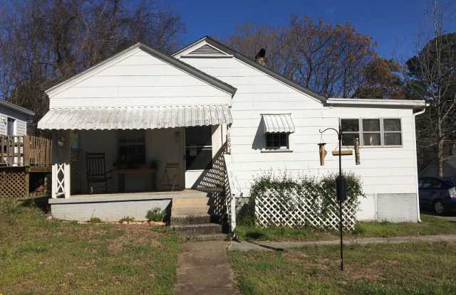 Charming 2-Bedroom, 2-Bath Single-Family Home with Sunroom & Wooded Views photos photos