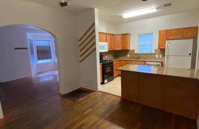 UT PRE-LEASE: Charming home 2 blocks from UT, Wood Floors, Updated kitchen, Walk/Bike to Campus Gallery 4