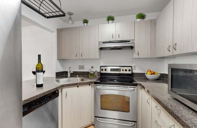 2 level condo, 3 decks, Stainless Appliances, 2 parking spots, Water, sewer, garbage included! Gallery 3