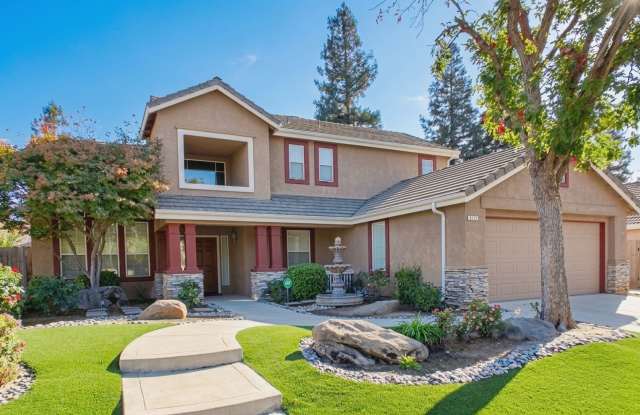 Radiant 4-bedroom, 3-bath home in Fresno, CA! Gallery 1