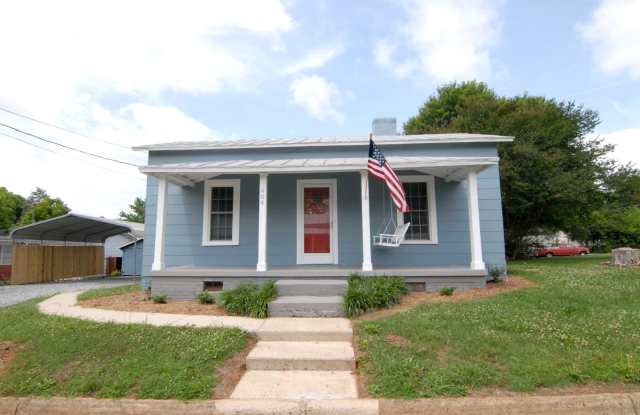 Charming blue renovated mill house 2 bedroom 1 bathroom in Downtown Graham with large lot, covered carport and storage building photos photos