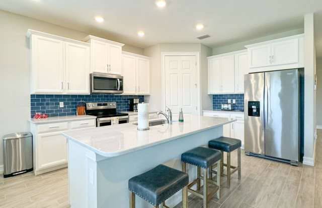 **NEW CONSTRUCTION**SEASONS TIDE** ANNUAL RENTAL **AVAILABLE FURNISHED OR UNFURNISHED** photos photos