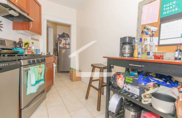 Beautifully updated 3 bed unit next to the Green Line in Allston. photos photos