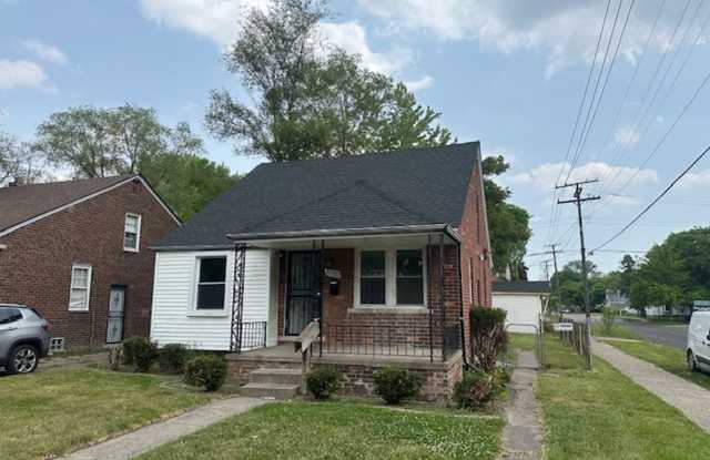 3 bed 1 bath Brick corner house with basement and Garage! photos photos