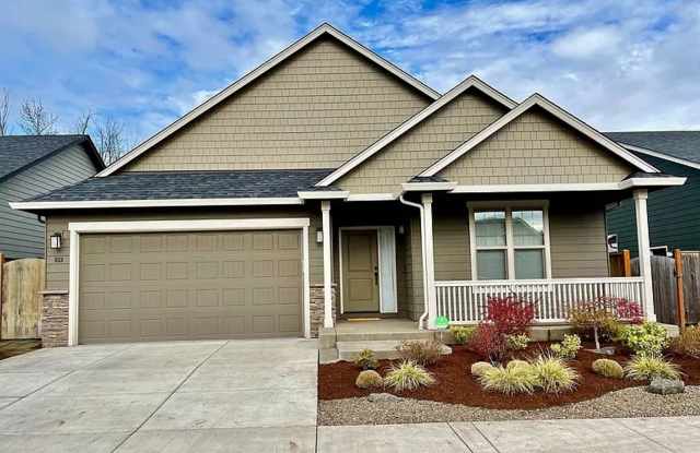 Newer, single level home with double garage photos photos