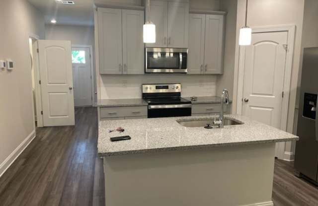 Modern 3-Bedroom Home with an Open Kitchen & Attached Garage Gallery 4