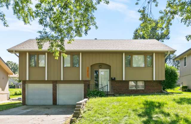 Stylish 3-Bed, 2-Bath Renovated Home with Granite Counters, 2-Car Garage  Large Fenced Yard in Omaha! photos photos