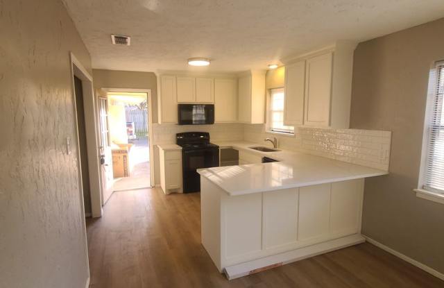 2/1.5 covered parking, fireplace photos photos