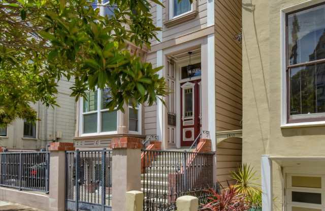 Completely Renovated Top Floor Unit in Victorian + Laundry in unit+ Contact for showing schedule! photos photos