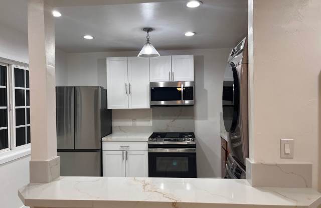 Totally remodeled 2 blocks to beach! FREE RENT UNTIL SEPT. 2 PARKING SPOTS photos photos