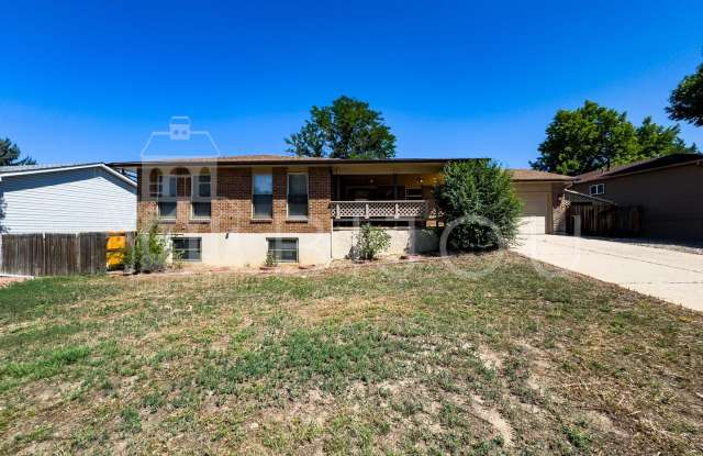 Large Main Level Living - 6350 Okeechobee Place, Cimarron Hills, CO 80915