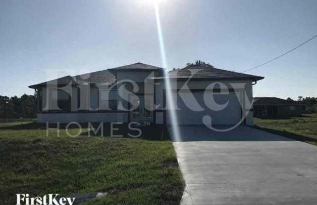727 Downer Avenue South - 727 Downer Avenue South, Lehigh Acres, FL 33974