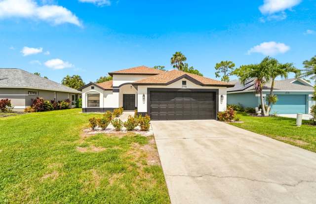 Newly renovated 3-bedroom, 2-bath single-family residence located in the Queens Park community. photos photos