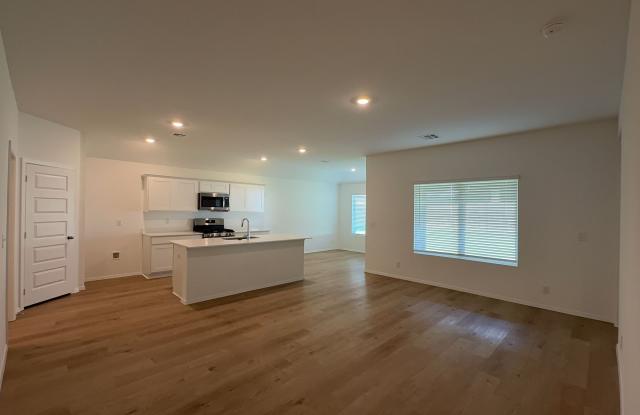 Beautiful new construction 4/2/3 home in Broken Arrow offering a contemporary open floor plan! Gallery 4