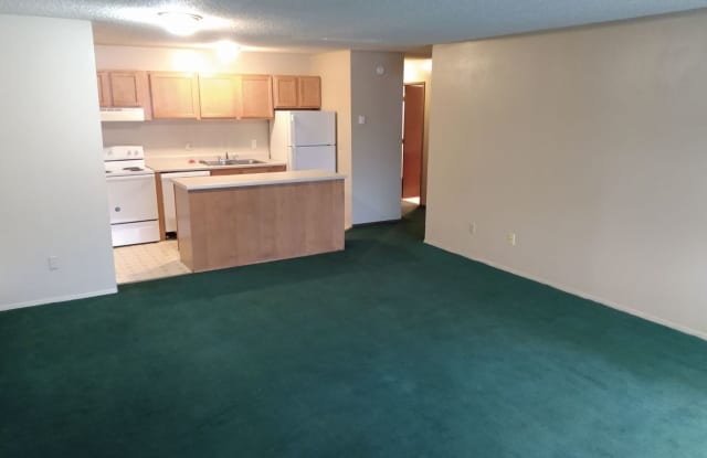 1 bedroom, 1 bathroom upstairs apartment - Cimarron Apartments Gallery 1