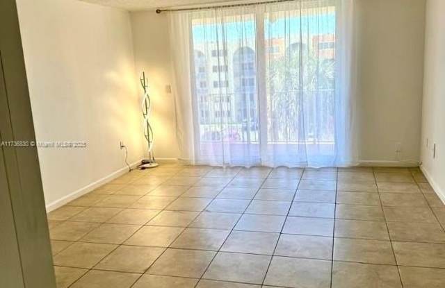 6980 NW 186th St - 6980 Northwest 186th Street, Country Club, FL 33015