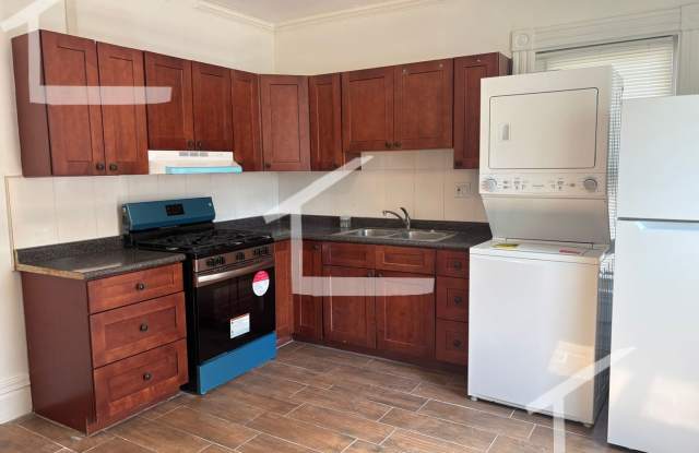 Huge 4 bed 2 bath unit with in-unit laundry! photos photos