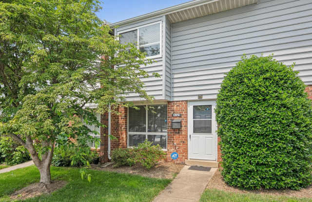 This bright and welcoming three bedroom one and a half bath home offers a comfortable and stylish living space. photos photos