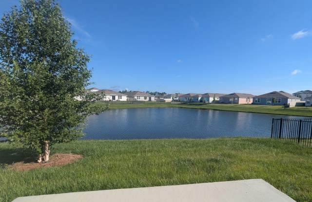 ENJOY the POND VIEW at an amazing price on our 18mo Lease!! Both 12mo and 15mo are also available. ENTRADA SUBDIVISION - 2024 BUILD - 4/2/3 CONSTRUCTION WITH OVER 2,140 sqft IS NOW AVAILABLE!! - 82 Tordera Lane, St. Johns County, FL 32084