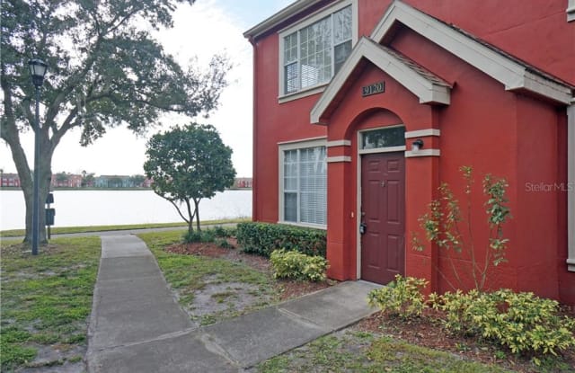 9120 LAKE CHASE ISLAND WAY - 9120 Lake Chase Island Way, Westchase, FL 33626