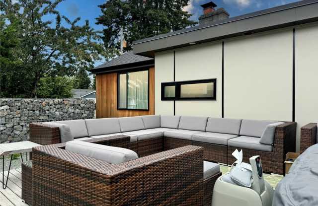 Remodeled 3 bdrm home on a large lot with 500 sq ft wrap around deck! photos photos