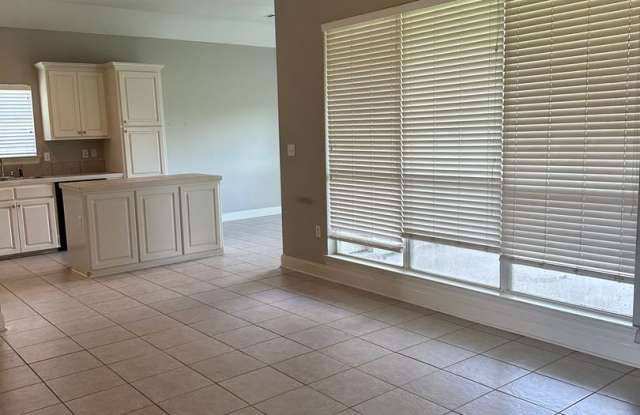 Must see! Available Now! Nicholson Lake Subd. 3/2 with an Office and Lake View Gallery 4