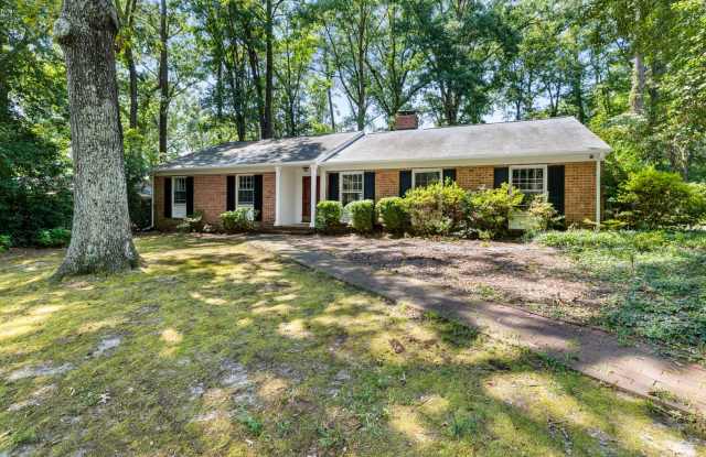 Henrico County classic all-brick ranch offers 2,553 square feet of light-filled, comfortable living with garage & private, wooded lot Gallery 1