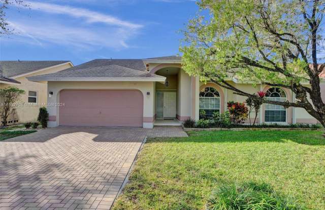 9832 NW 54th Pl - 9832 Northwest 54th Place, Coral Springs, FL 33076