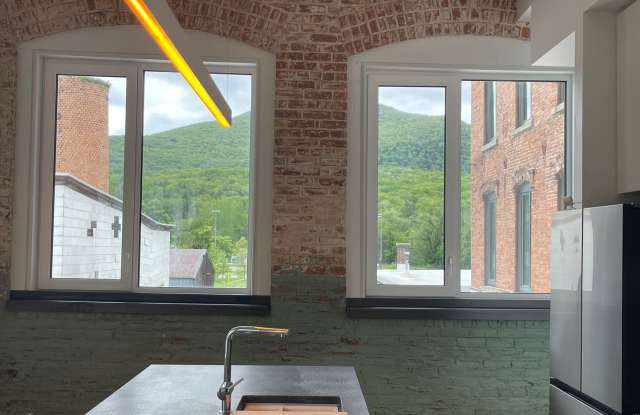 Historic Charm, Modern Luxury,  2 bedroom condo at Greylock Works! Gallery 4
