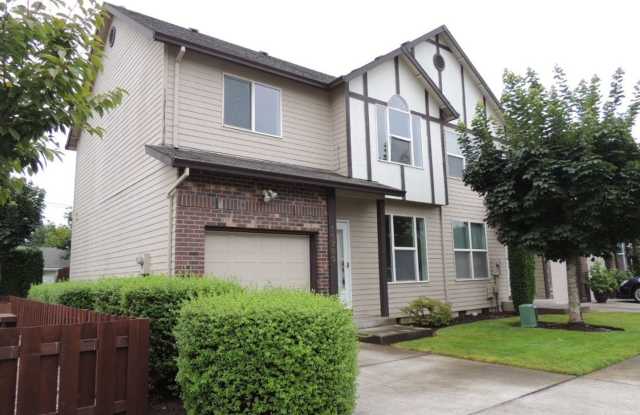 MOVE-IN SPECIAL – 1/2 Off First Month’s Rent! Charming 3-Bedroom End-Unit Townhome with Attached Garage & Private Yard! Gallery 1