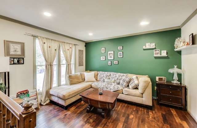 Beautifully Updated Winchester-Built Townhome Backing to Serene Parkland. Gallery 3