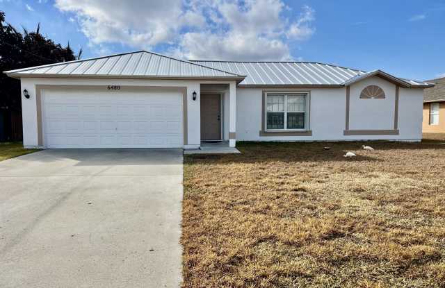 6480 NW Volucia Drive photos photos