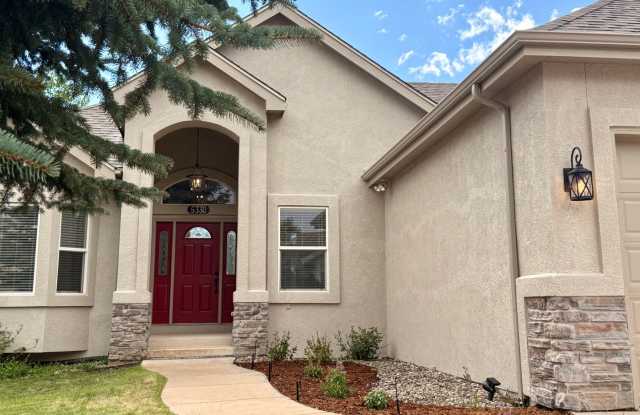 Stunning 5 Bedroom Walk-Out Ranch Style Home with Pikes Peak Views photos photos