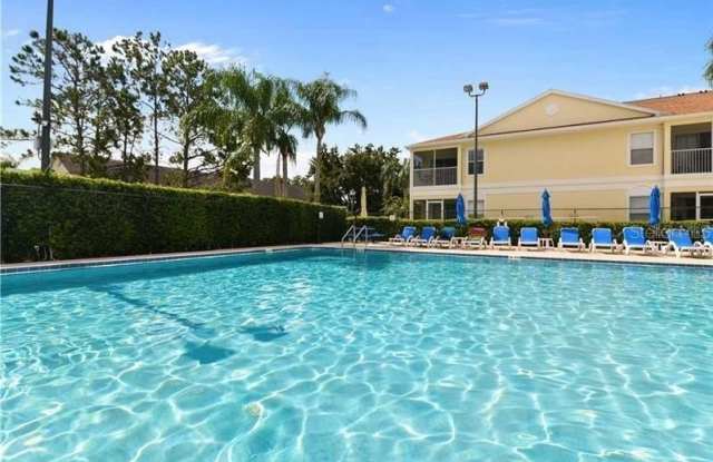 8838 CORAL PALMS COURT - 8838 Coral Palms Court, Four Corners, FL 34747