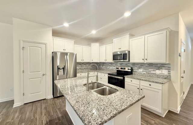 Spacious 3BD, 3.5BA Clayton Townhome with a Large Bonus Space Downstairs and Easy Access to Highways Gallery 3