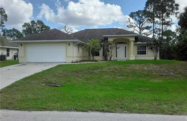 1093 Countess AVE - 1093 Countess Avenue, Lehigh Acres, FL 33974