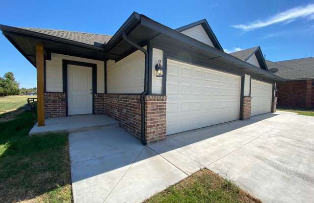 Brand New 3 Bed 2 Bath Duplex located in Bethany! photos photos