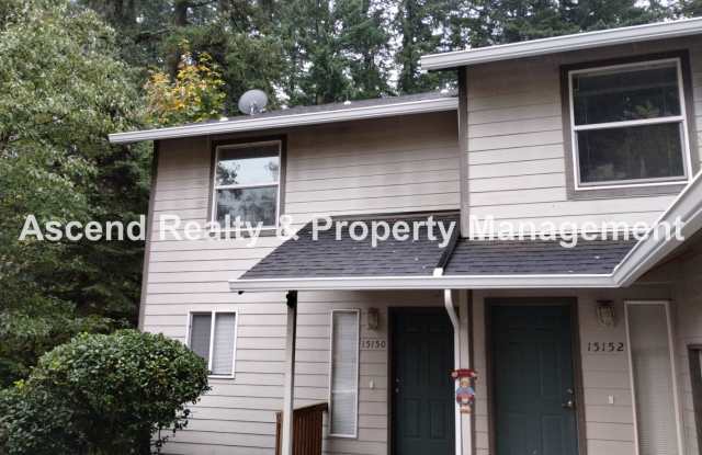 Price Reduced! Beautifully Updated 2 Level Duplex Backs to Forest, 1 Car Garage, Upstairs Laundry, Minutes to Nike photos photos