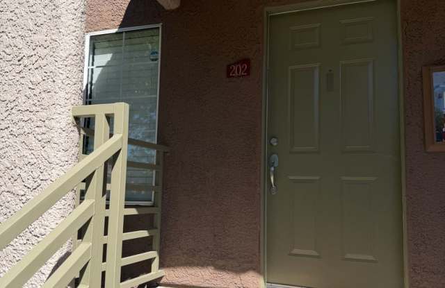 Upgraded upstairs condo with views of greenbelt and community pool photos photos